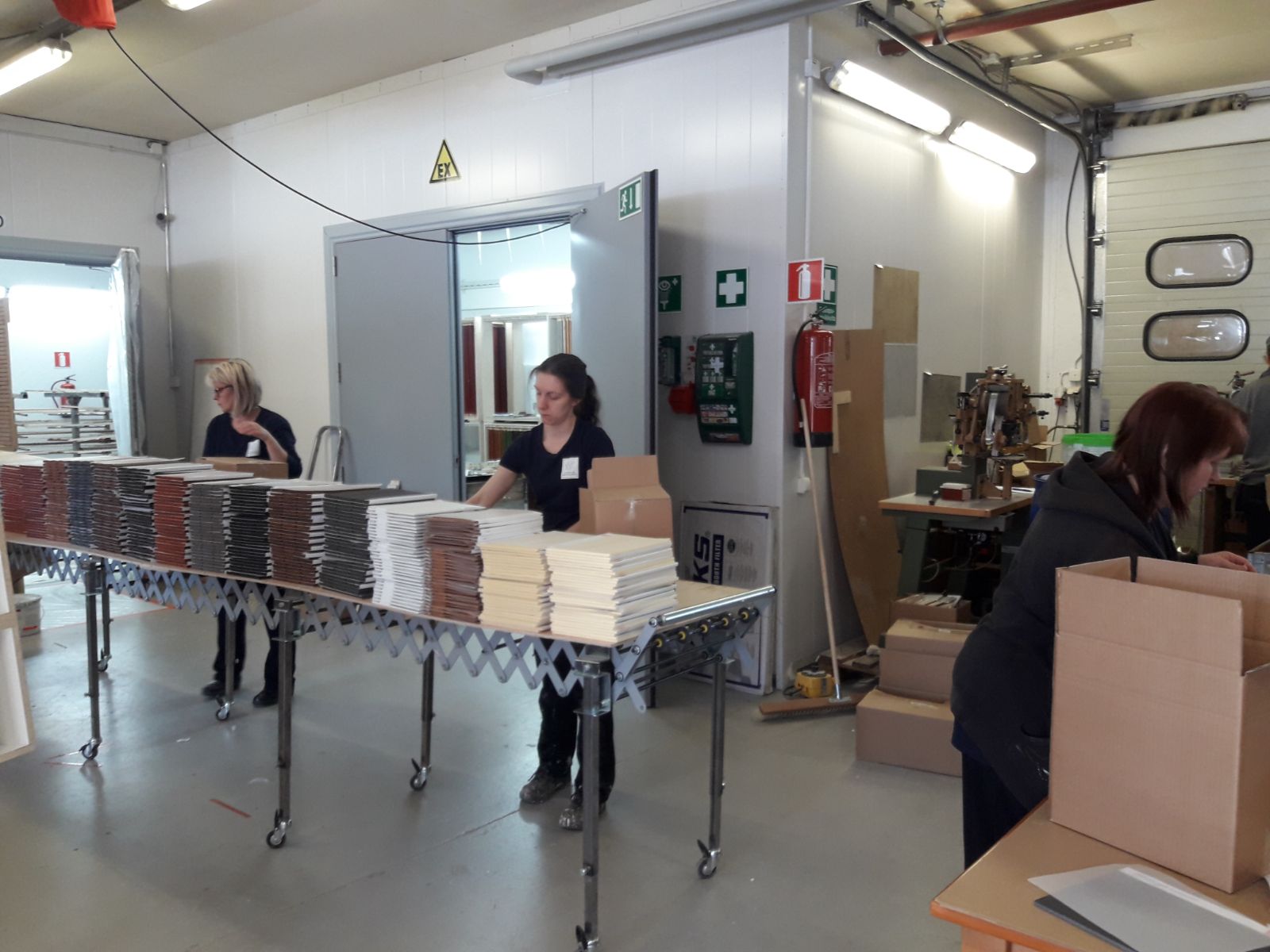 People working in the warehouse - packaging